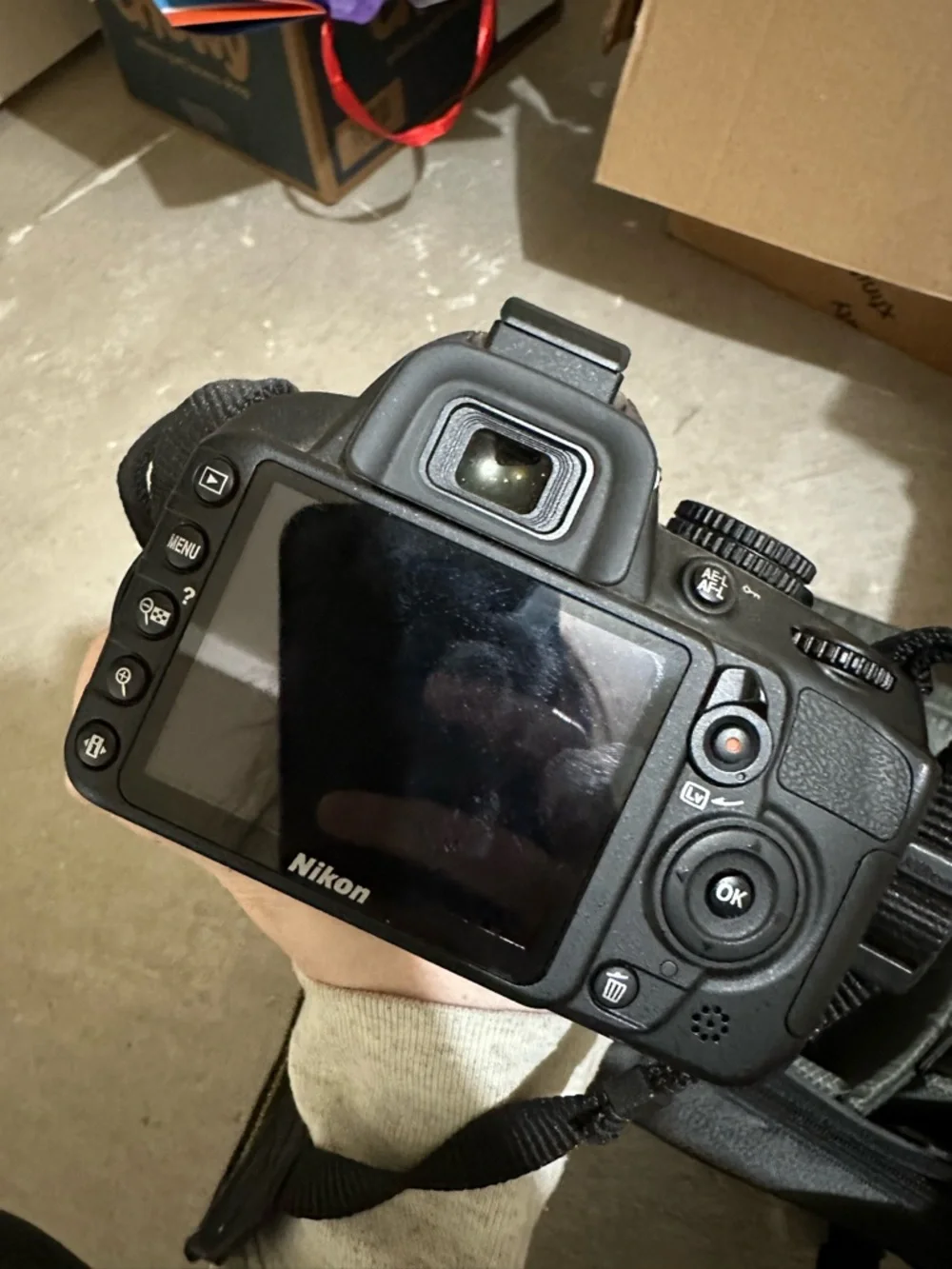 Nikon D3100 DSLR Camera Kit in Black and Yellow-Accented Strap